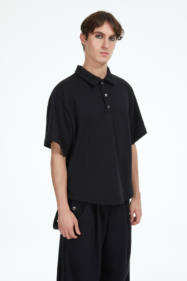 Black polo shirt with snaps